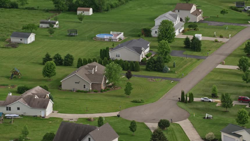 The homes all have green lawns