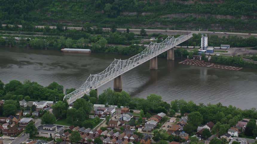 Aerial scenery of a bridge over a river canal in an urban city