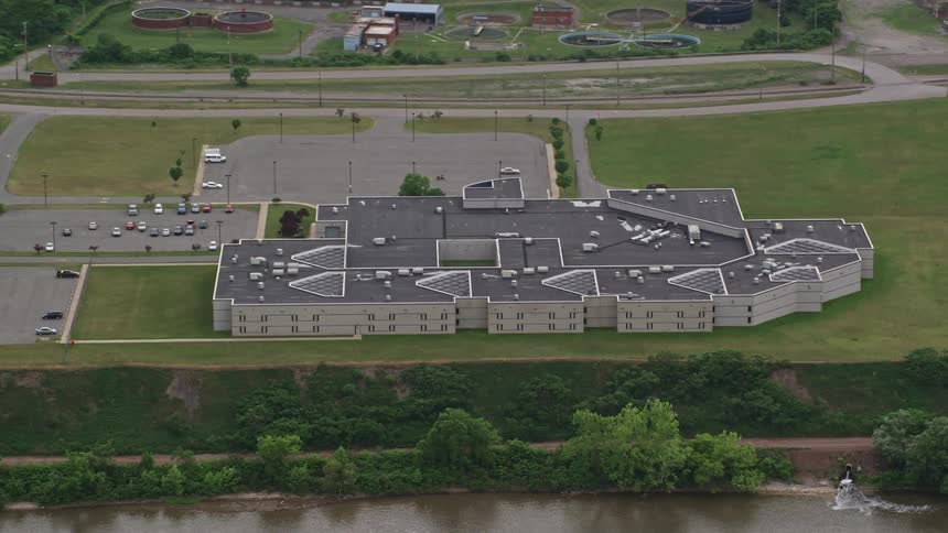 Aerial view of a twostory building complex in a rural area