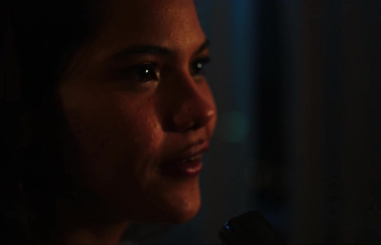 Two girls singing on a party at night