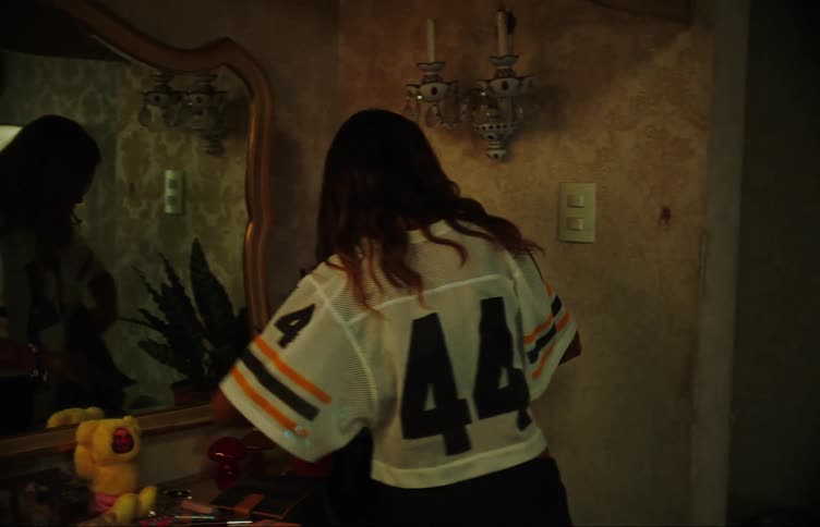 A romantic moment between two female couples in a room
