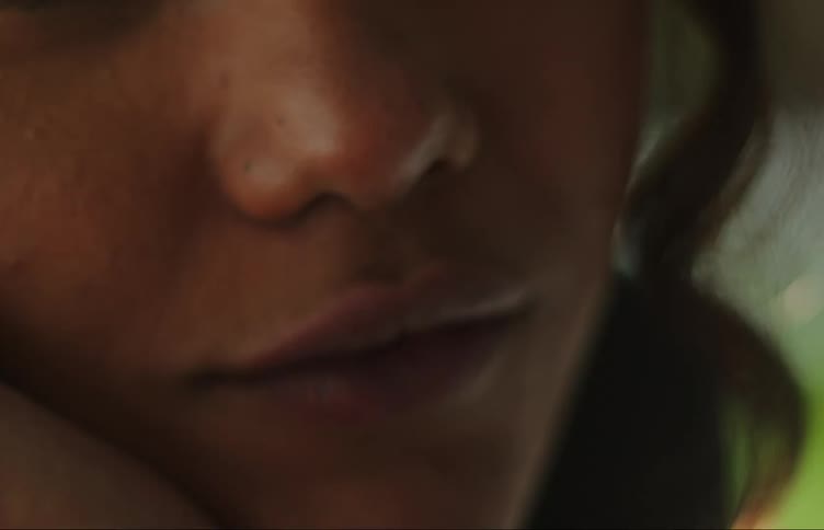 Closeup of a young womans face talking and smiling