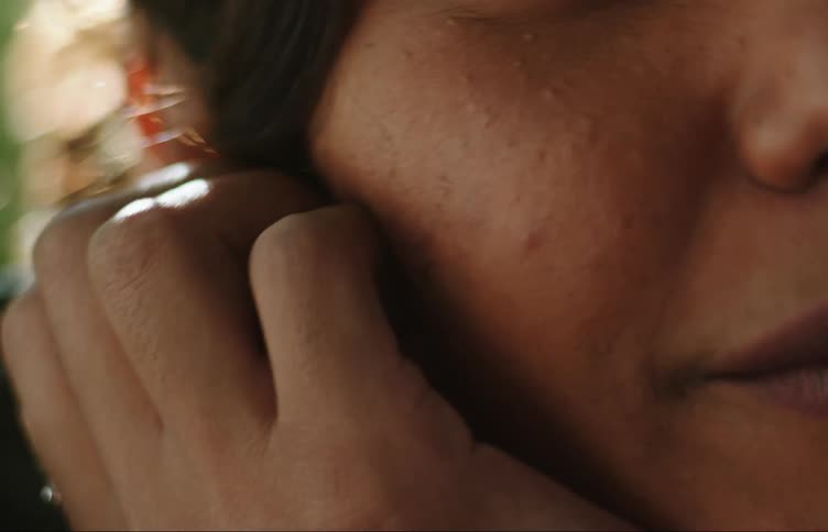 Close up of the face of a young teenage girl talking