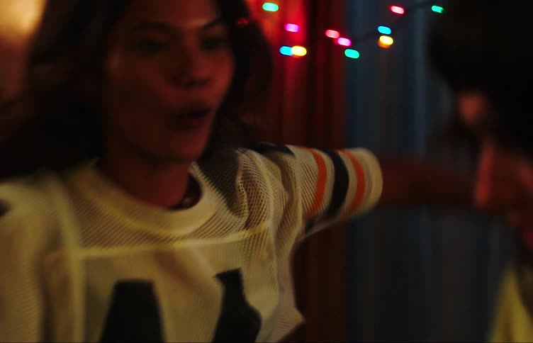 A clip of a ladies dancing in a room