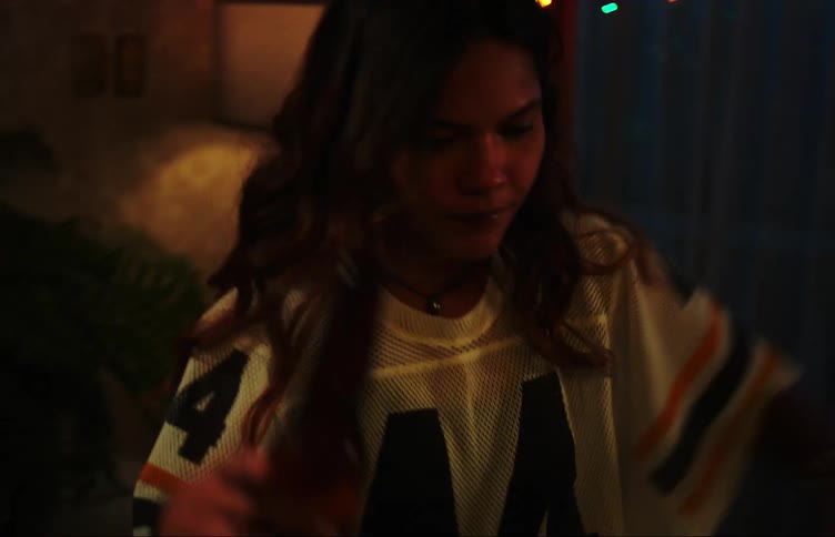 Two female friends drinking beer and dancing in thier bedroom having fun
