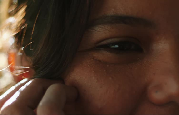 A smiling young womans eyes