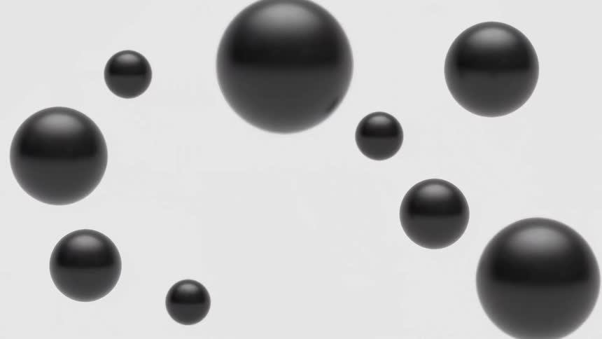 A black soccer ball breaks up transforming into smartphones