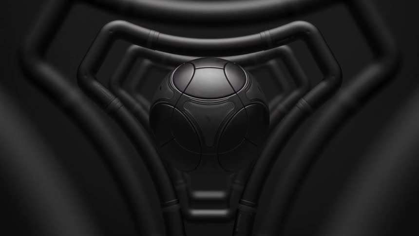 A black soccer ball that is between dark objects that light up in sequence