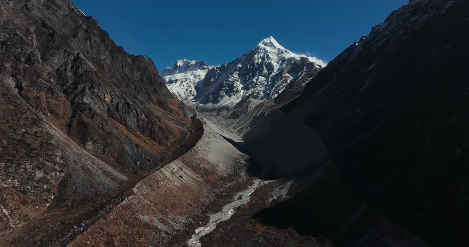 Aerial view of the barren slopes of a mountain range