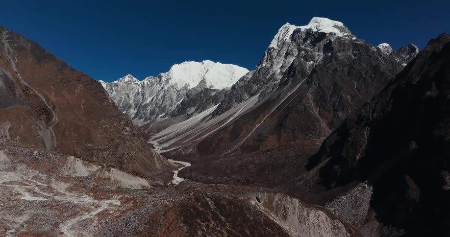 Geological and rocky mountains with cliffs and snow