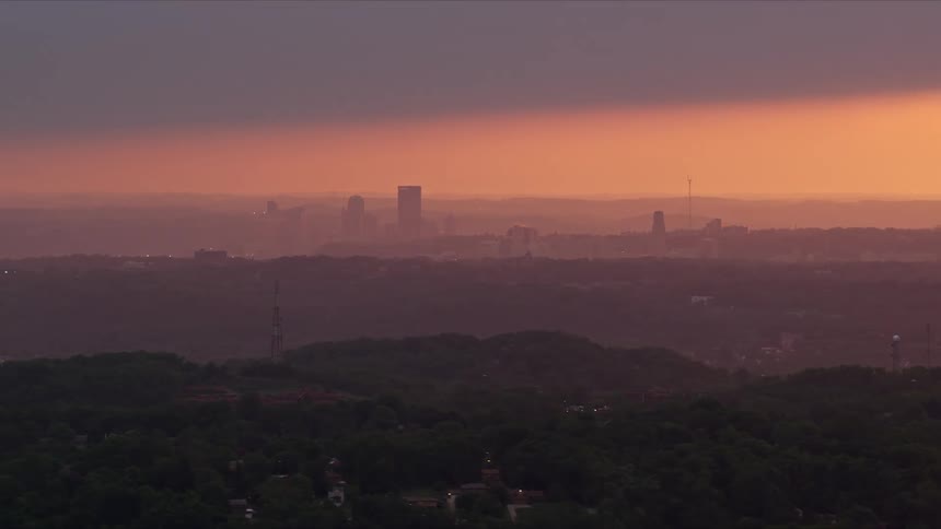 Aerial view of the city skyline at sunset