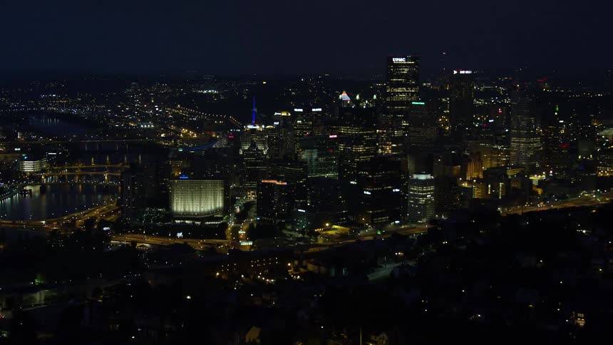 Aerial view of a city skyline at night