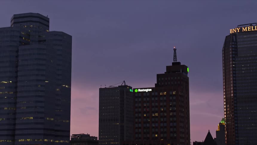 Aerial view of a city skyline at dusk