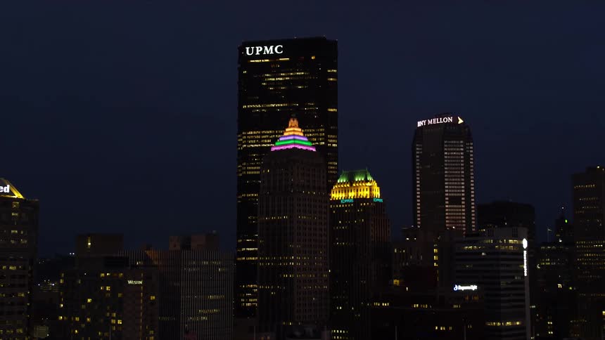 The image shows the skyline of new york city at night