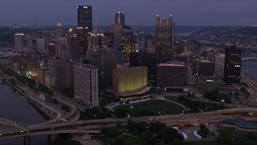 Traffic moves over river bridges in a big city