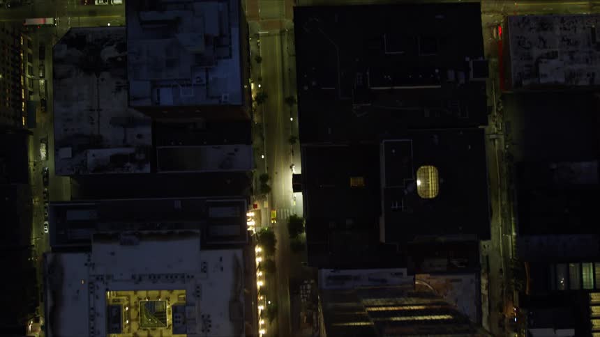Cars drive through the city