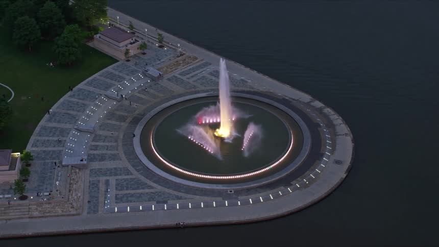 Aerial panorama of a square with a fountain by the sea on a morning
