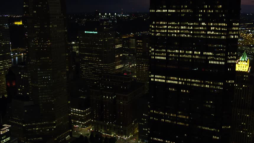 Metropolis with urban and commercial buildings and skyscrapers in a city illuminated at night