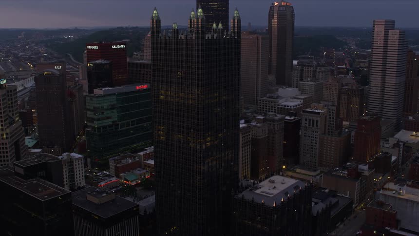 Tall city buildings during the night time