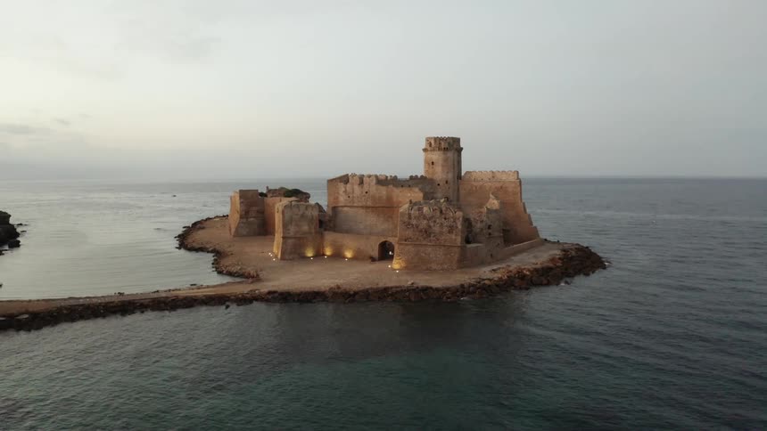 A ruin of an abandoned fortress in the middle of the sea