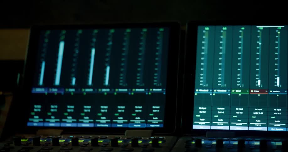 Close up of a recording desk meters in a studio