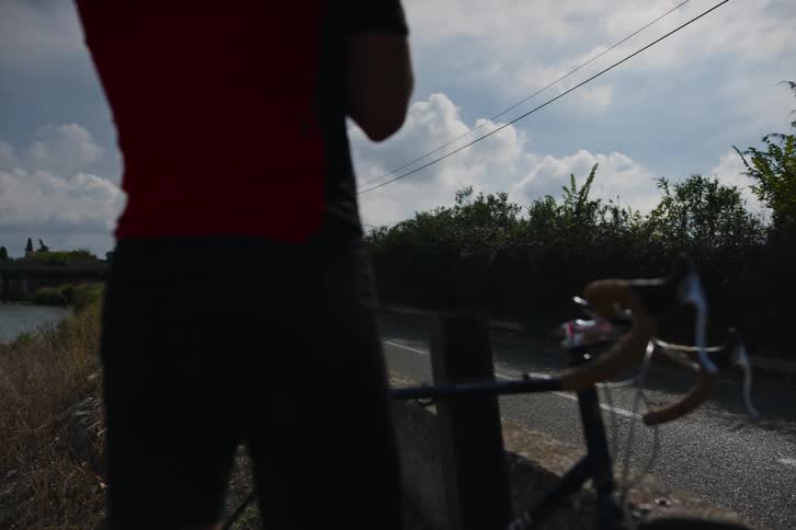 Several young men involved in bicycling