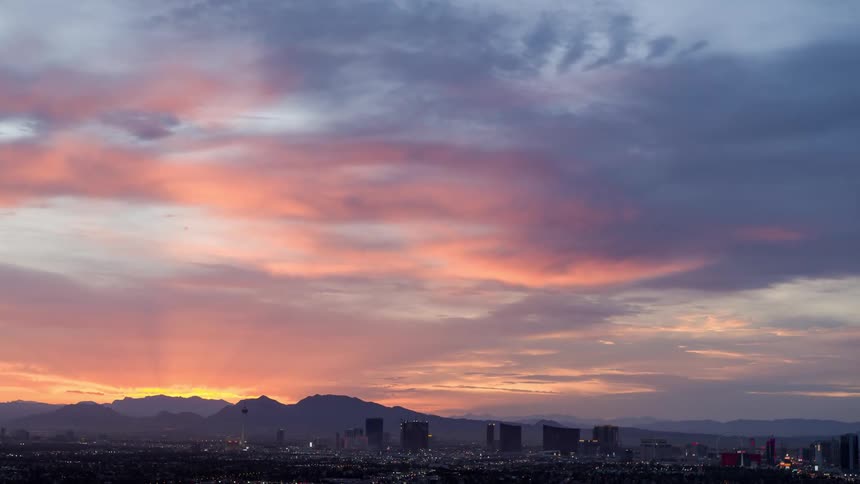 The sun is rising on the city