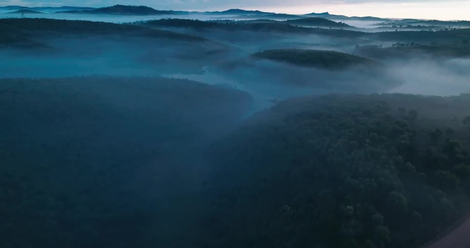 Forests and mountains with bodies of water in a rural area