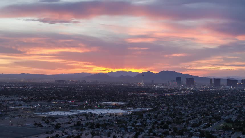 The camera pans revealing the las vegas city skyline at dawn