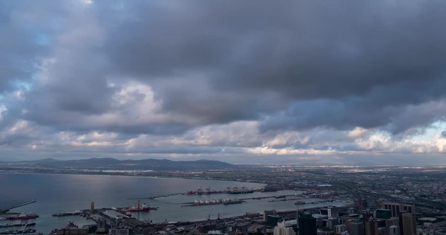 Timelapse footage of a city skyline and clouds