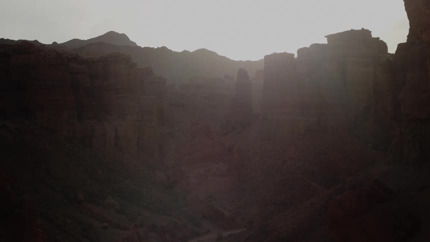 A canyon between rocky mountains