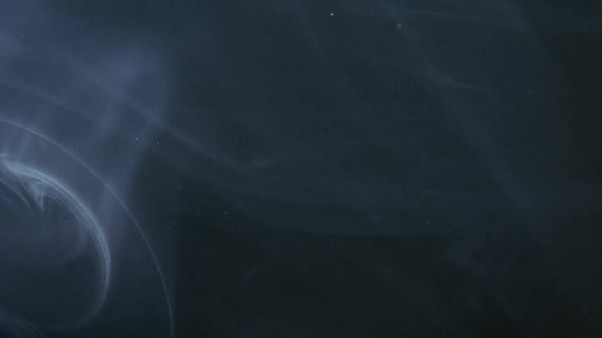 A thin layer of white smoke meets the black background