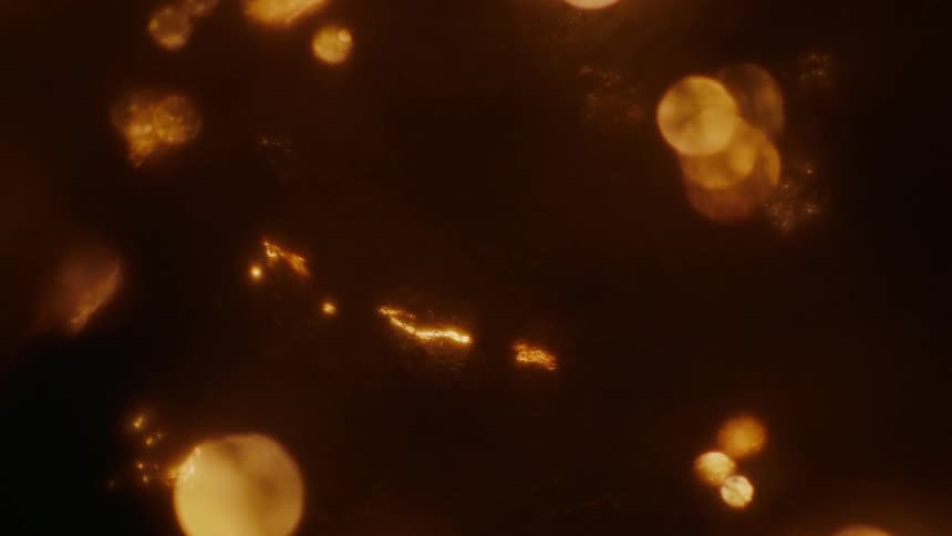 Reflection of small bubbles in abstract bright flames