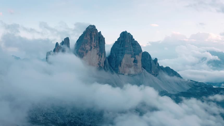 Clouds cover a part of a mountain range