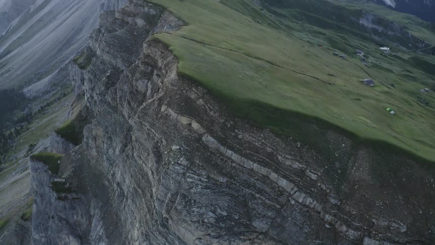 Houses built on a plateau at the top of a mountain