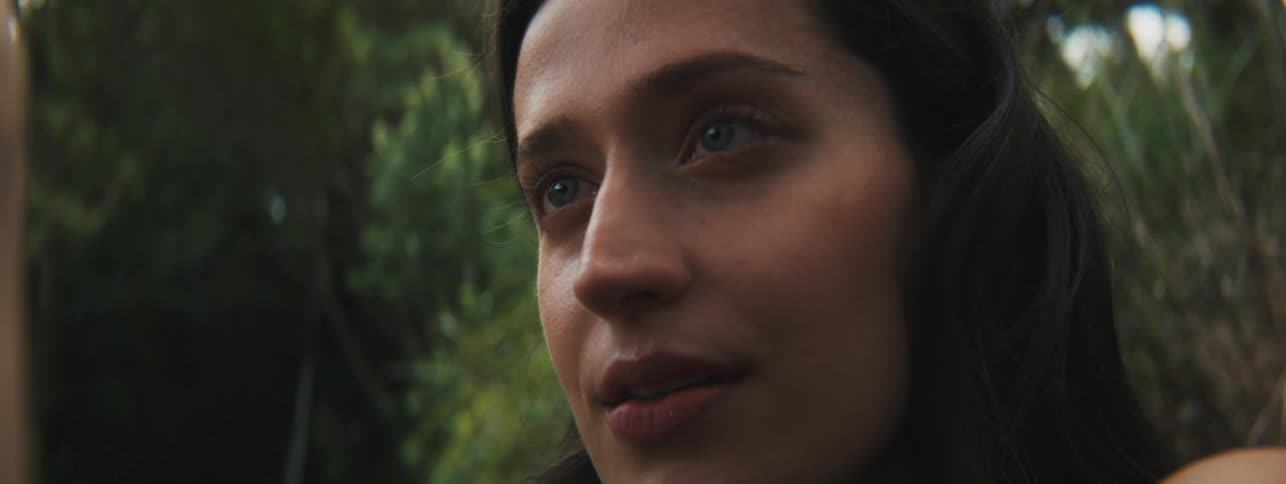 Portrait of a concentrated young woman in an outdoor environment