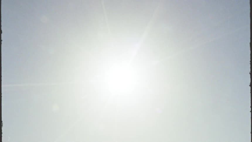 The sun passes by the sky