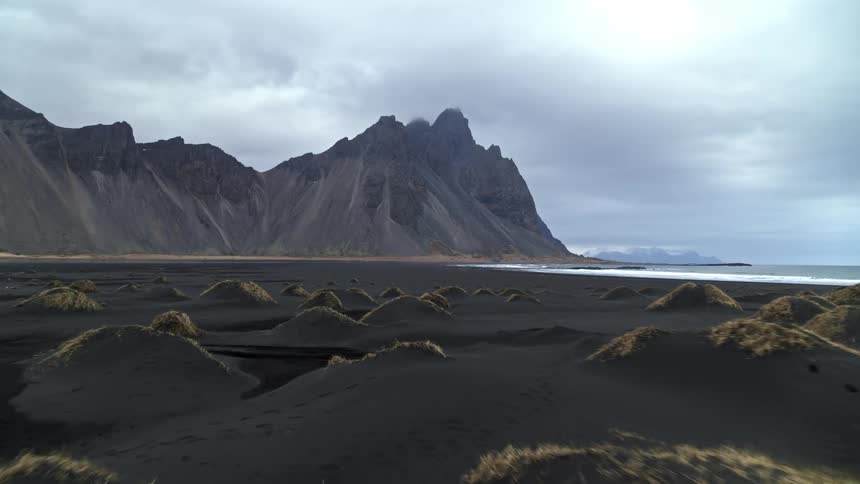 Tall mountains line the shore