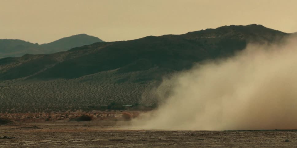 Smoke is covering the deserted landscape at dusk