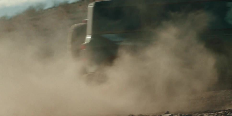 The truck is driving off road