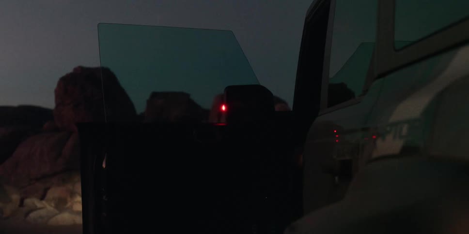 A public official closes his vehicle door