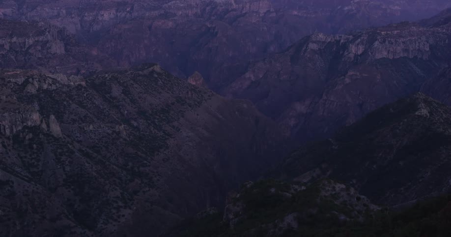 Panorama of rocky mountains with erosions in a morning