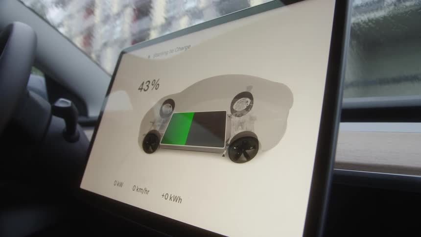 Tablet connected to the inside of a parked car
