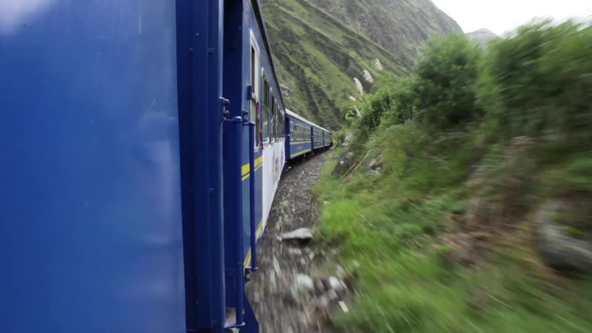 Riding along the side of a train