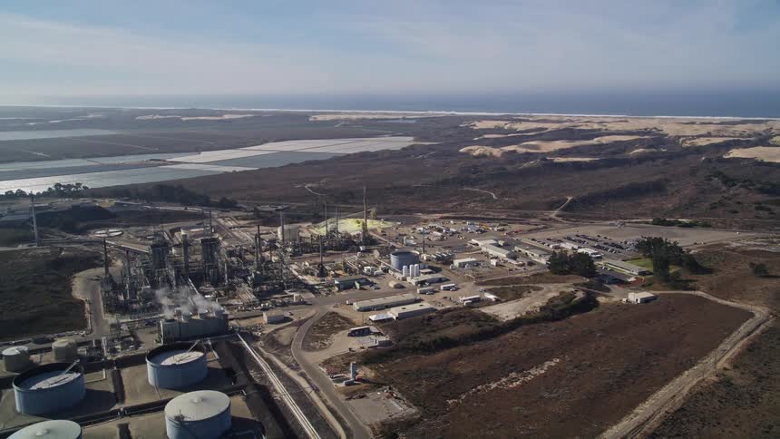 The factory is in the middle of the landscape
