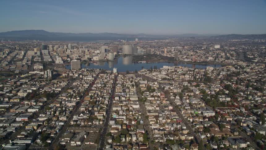 Aerial view of downtown oakland california approaching lake merritt