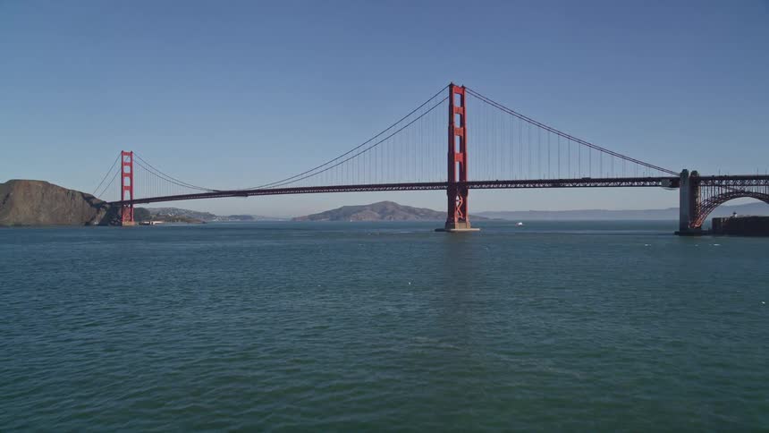 An aerial view of a bridge outdoors on a sunny day