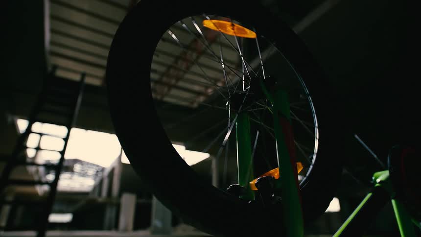Bicycle upside down with the wheel spinning