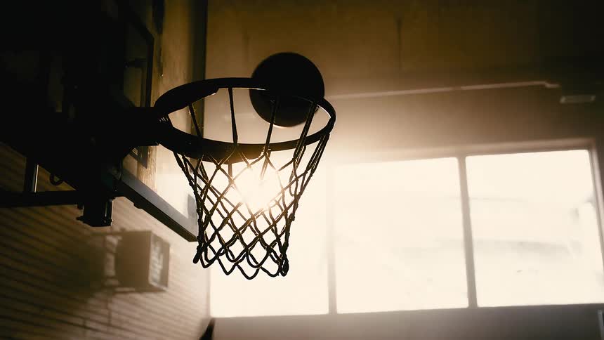 A basketball player scoring a point