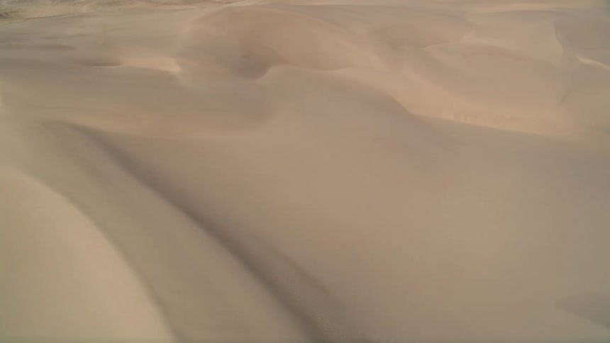 Aerial view of white sand dunes in the desert